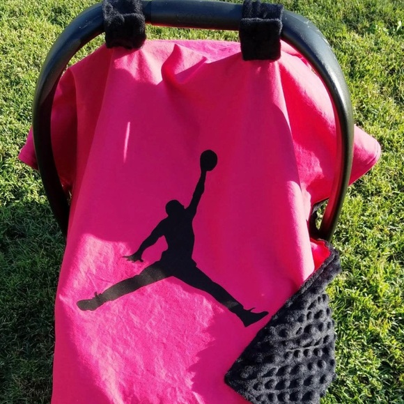 Pink Jordan car seat cover